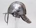 a "lobstertail" helmet, with a long neckguard