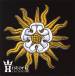 a uniform emblem, comprising of a white rose surrounded by yellow sunbeams on black fabric